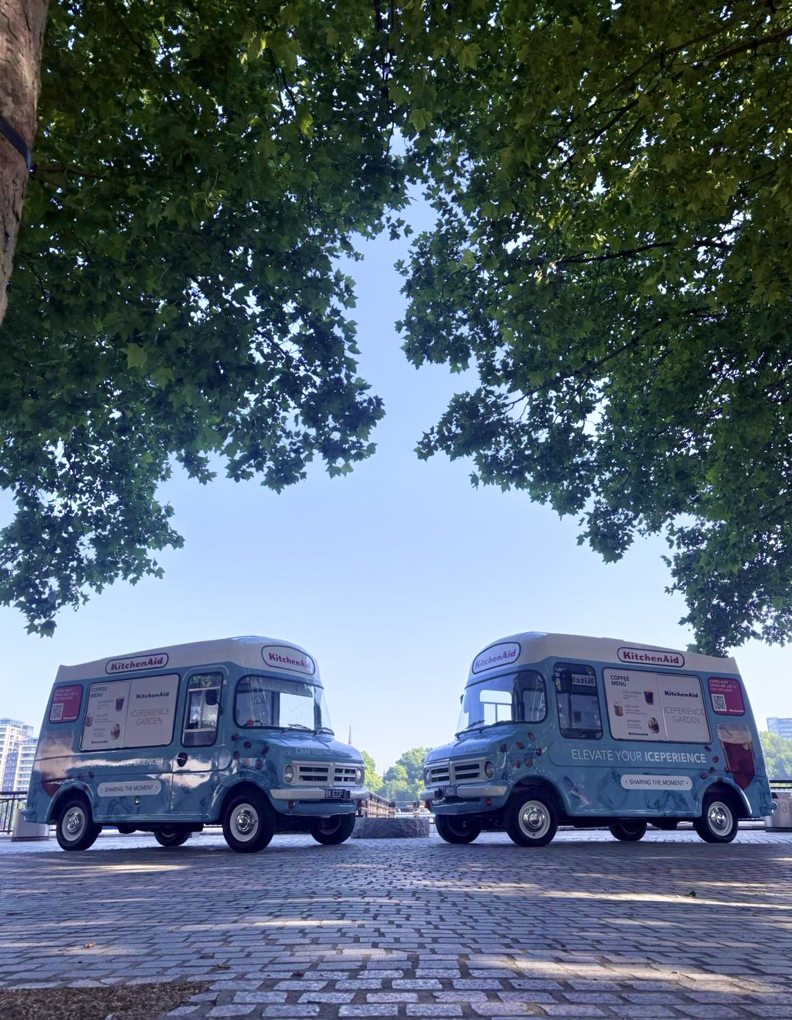William and Percy facing one another beneath trees